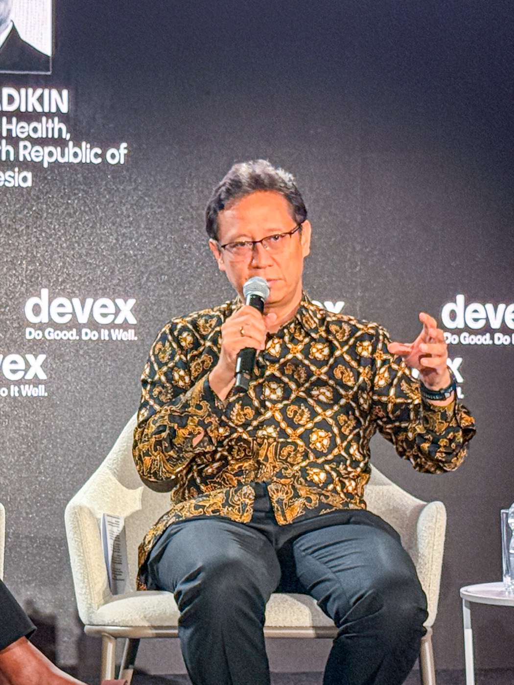 Close-up of Minister Budi Gunadi Sadikin speaking at Devex Impact House